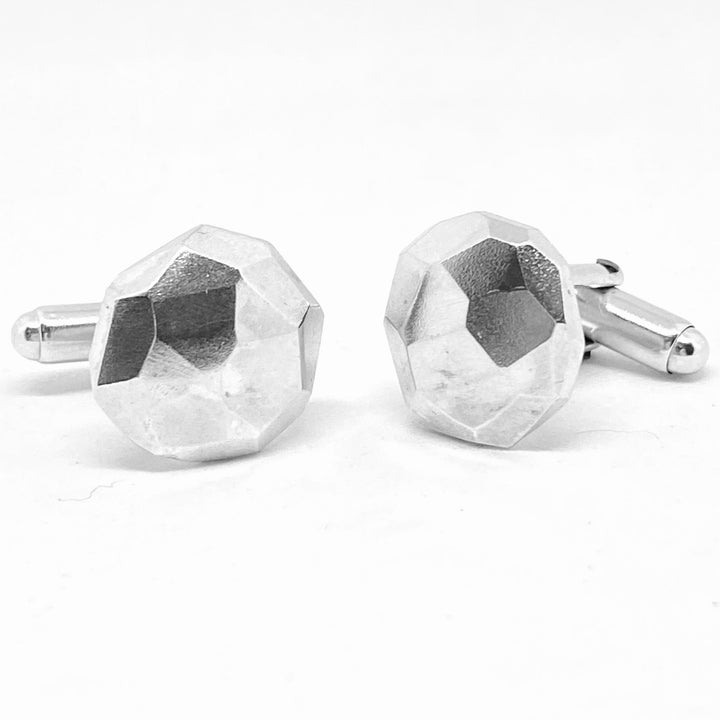 Full image of faceted Cufflinks. These cufflinks are in the shape of octagon and have a faceted texture.