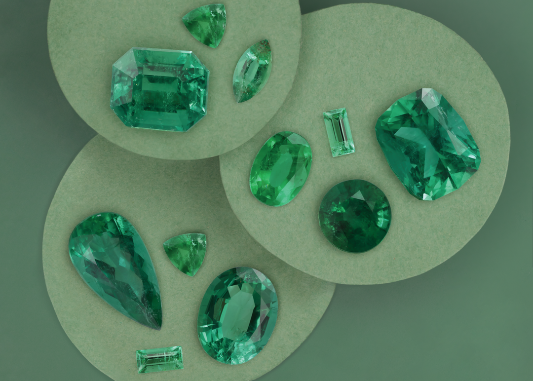 Emeralds of different shades and cuts