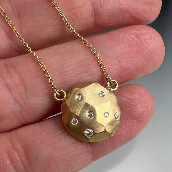 Faceted large dome pendant with diamonds