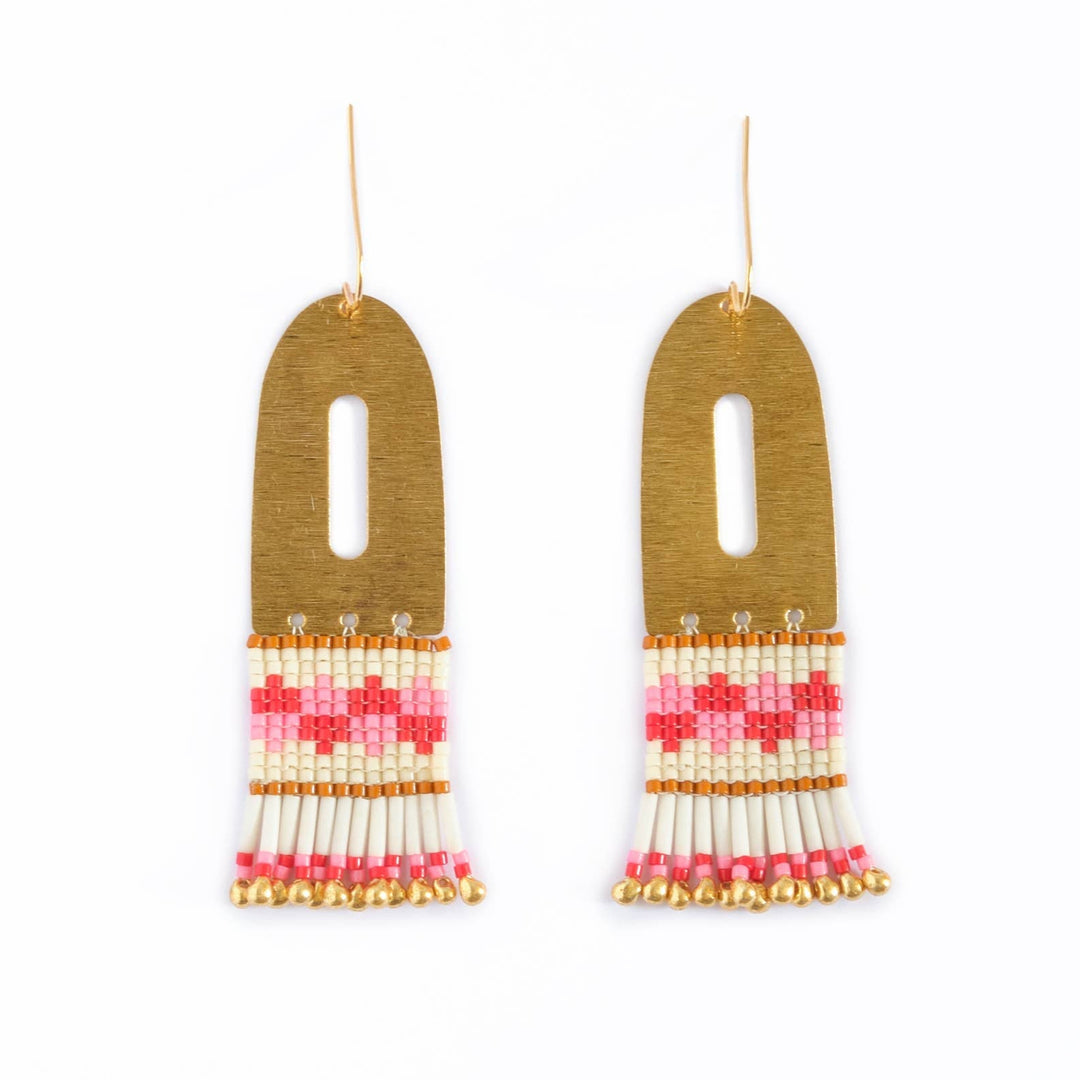 Pair of gold earrings with colorful tassel designs on a white background