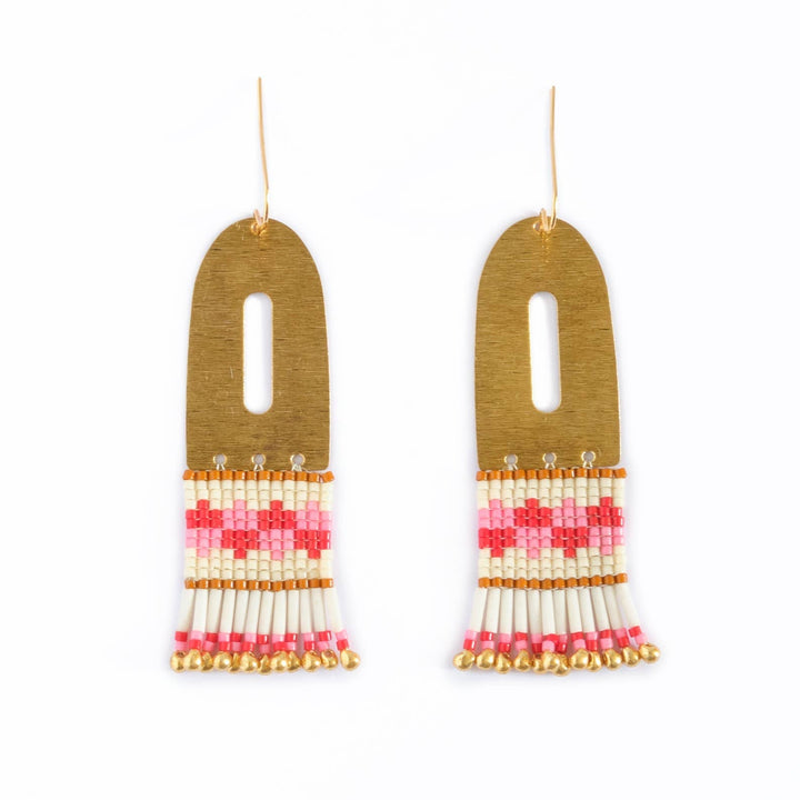 Pair of gold earrings with colorful tassel designs on a white background