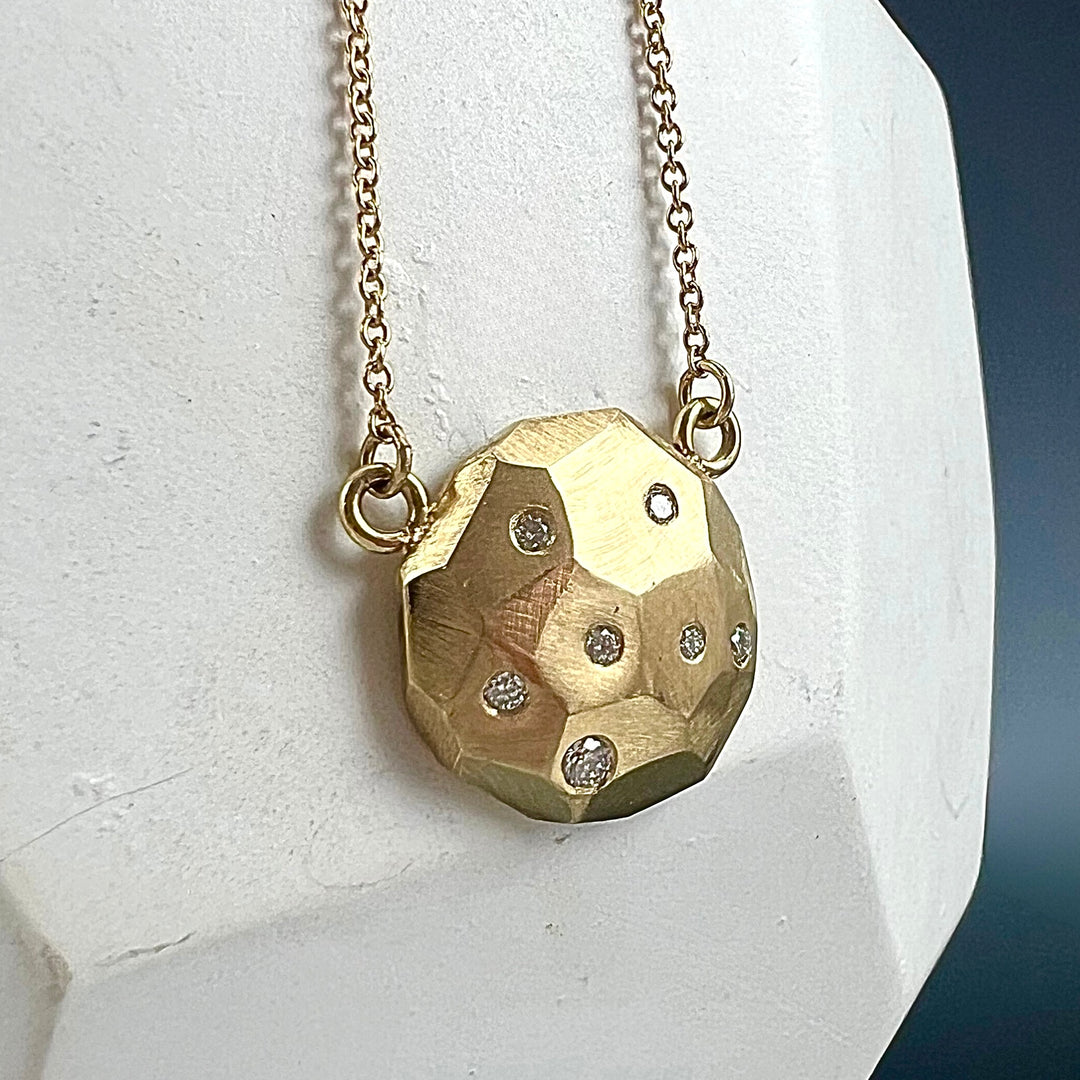 Faceted large dome pendant with diamonds