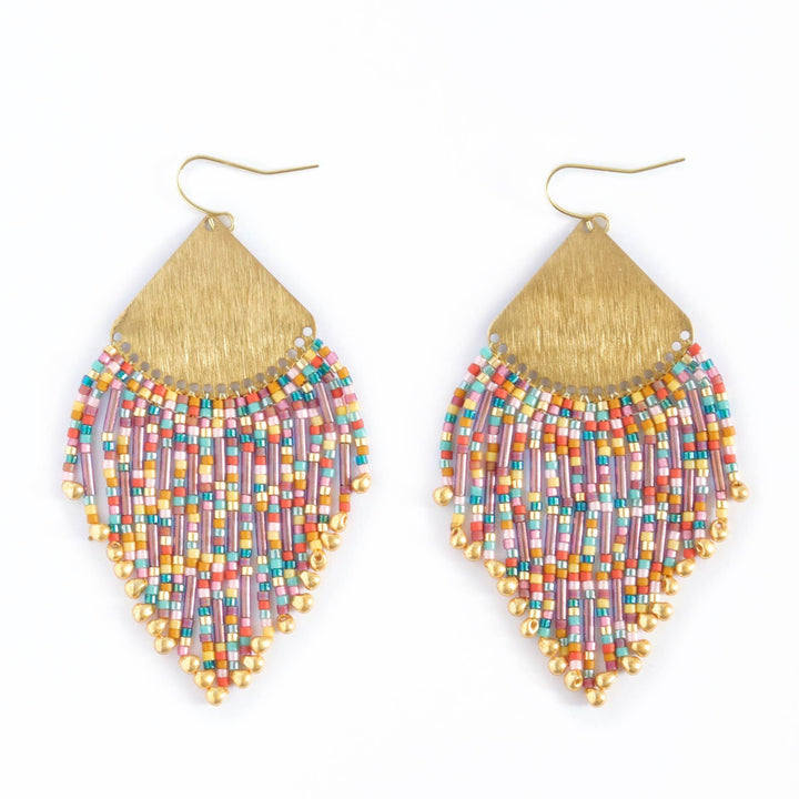 Multicolored beaded earrings with gold fringe on a white background
