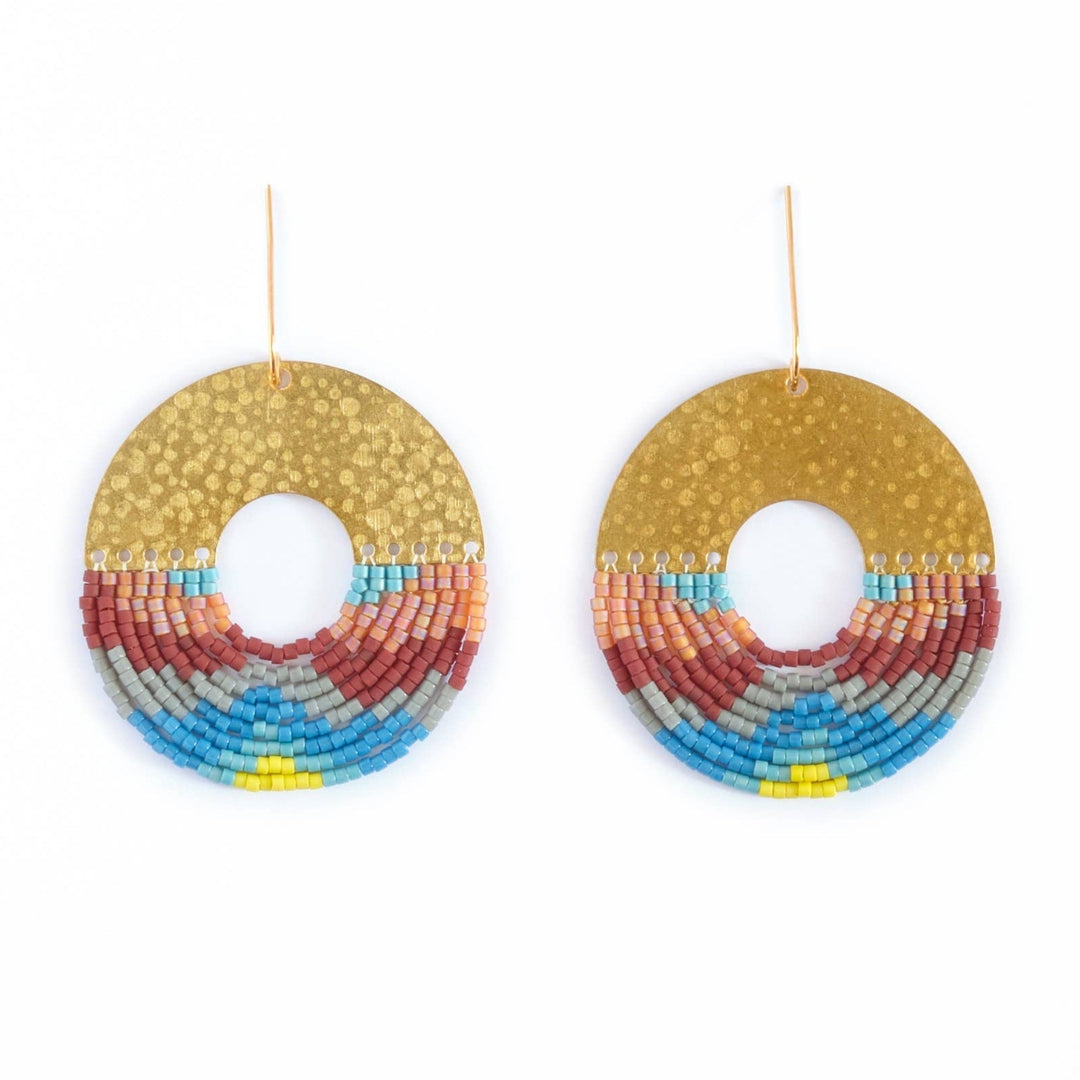 Pair of colorful beaded earrings on a white background
