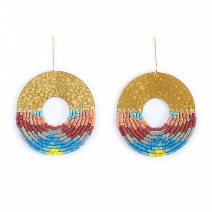 Pair of colorful beaded earrings on a white background