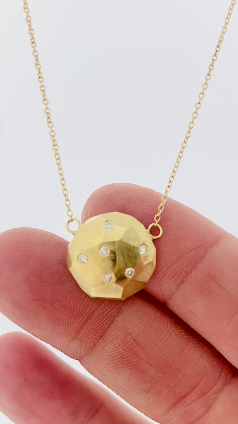 Faceted large dome pendant with diamonds