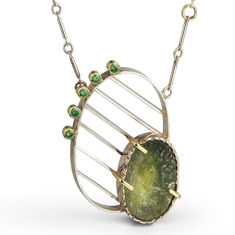 Close up view of pendant on Striated necklace - Green Beryl and Green Diamond.