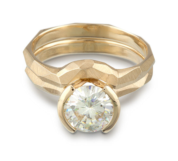 Contoured Wedding Ring and Engagement ring set in 14k gold, featuring a faceted metal look.