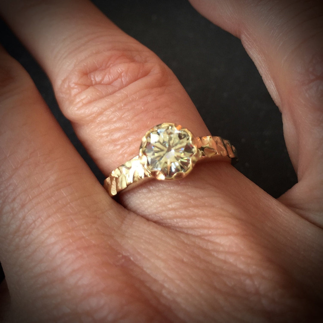 Full image of Moissanite Cobblestone Engagement Ring on hand to give idea of scale of piece.