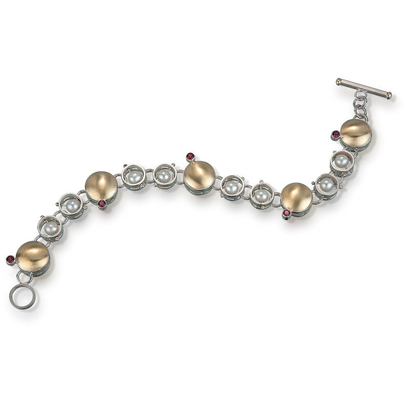 Sterling & 18k gold circle linked bracelet with pearls and garnet gemstones.