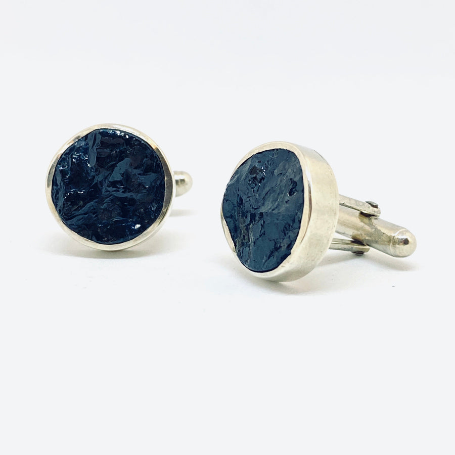 Full view of front and side profile of Round Black Tourmaline Cufflinks. These cufflinks are in the shape of a circle and set in silver.