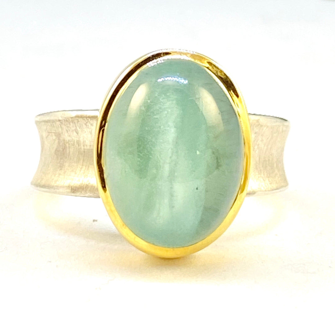 Full view of Aquamarine Valley Ring on white background.