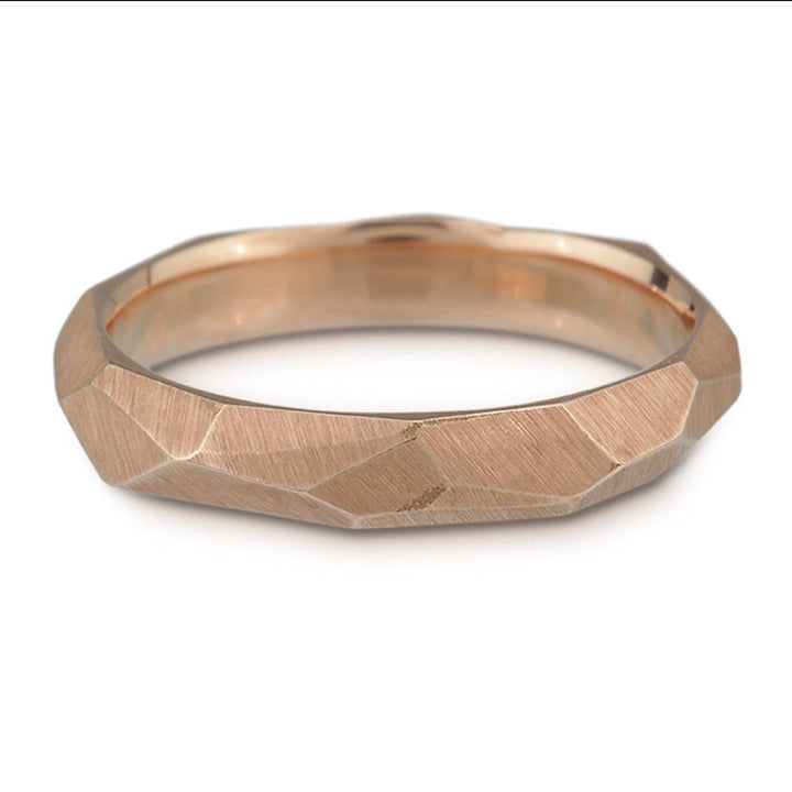 Full image of rose gold Women's facet ring. This band has a chiseled texture to it.