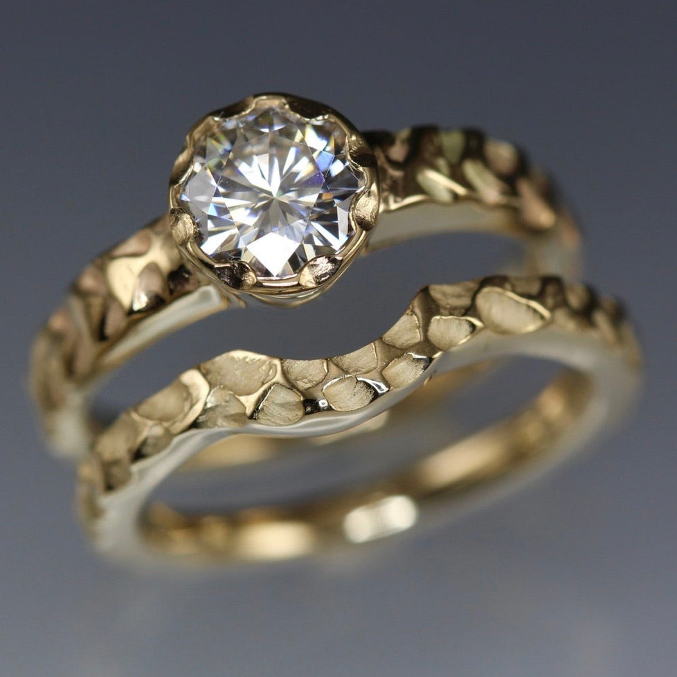 Full image of Contoured Cobblestone Ring with its matching engagement ring that has a set diamond. The arch within the ring is used to encompass half of the diamond on the second ring and to be able to act as stacking rings.