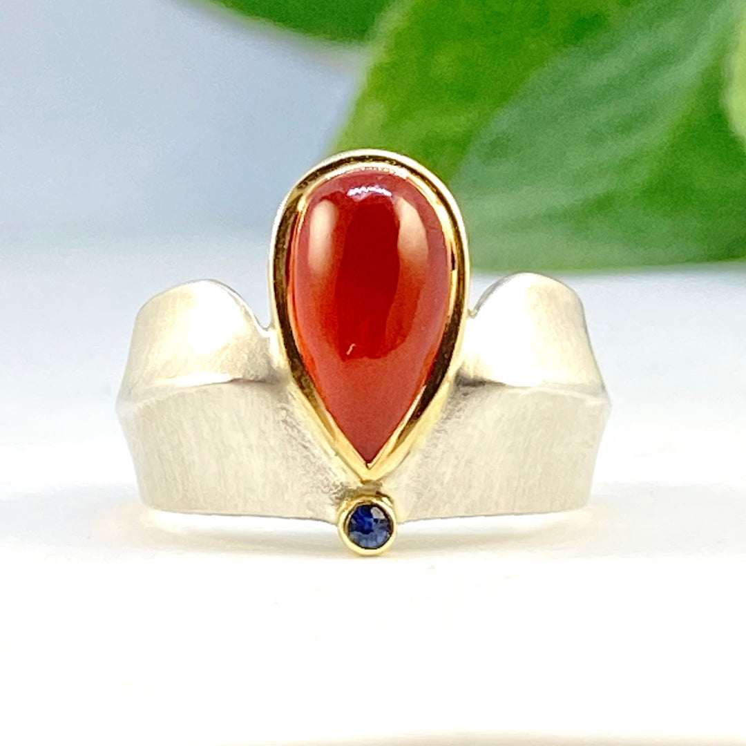 Full frontal view of Carnelian and Sapphire Ridge Ring.