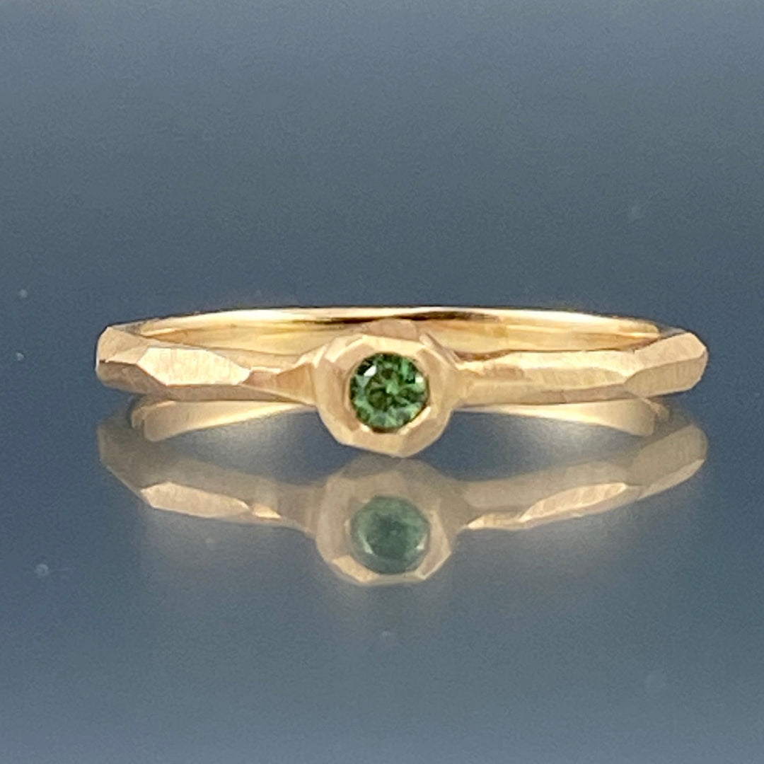 Full image of green diamond nugget facet ring.