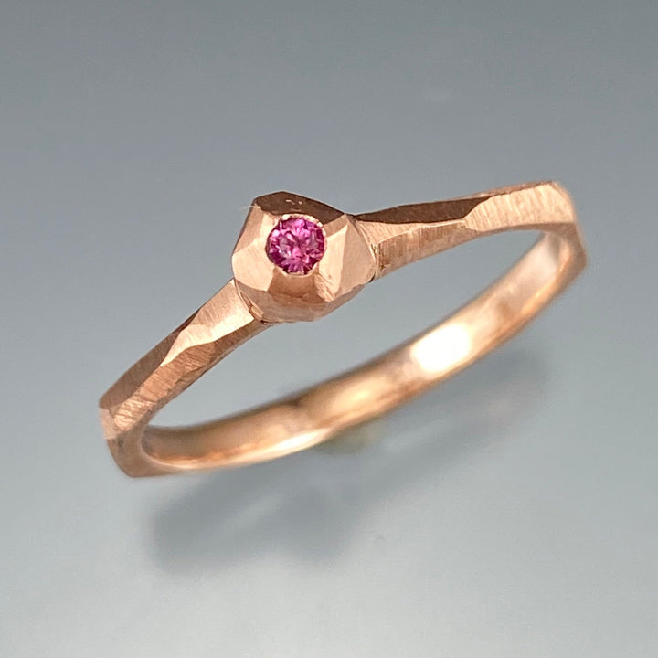 Full image of pink diamond nugget facet ring.